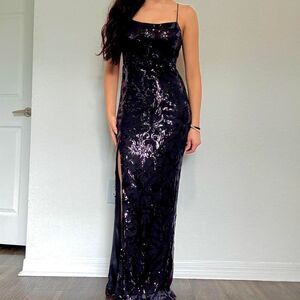 Striking black sequin maxi dress by Iris